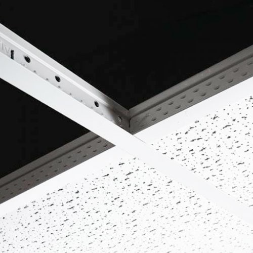 Techo falso de cielo raso de perforaciones de fibra mineral en blanco, ideal para oficinas y comercios.